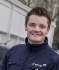 Pasfoto van Fer Megens met bedrijfsjas aan, toezichthouder industrieel ODZOB